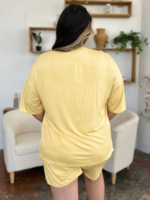 Yellow bamboo loungewear set with relaxed fit tee and shorts.