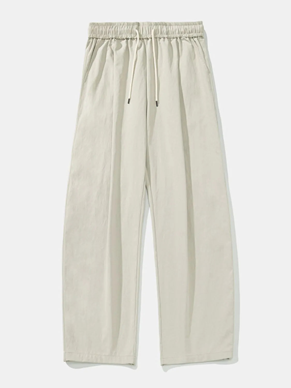 Balloon-fit drawstring trousers in light gray with a relaxed, casual style.