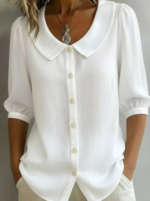 White button-down shirt with Peter Pan collar and puff sleeves