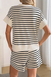 Classic striped half-zip two-piece set in beige and black cotton with short sleeves and shorts.