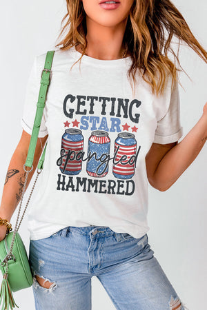White graphic t-shirt with American flag beer cans and text.