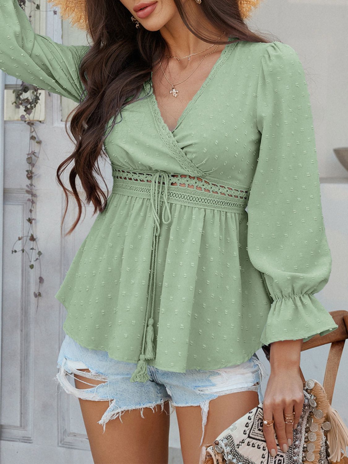 Gum Leaf Swiss dot wrap blouse with lace trim and tassel tie detail