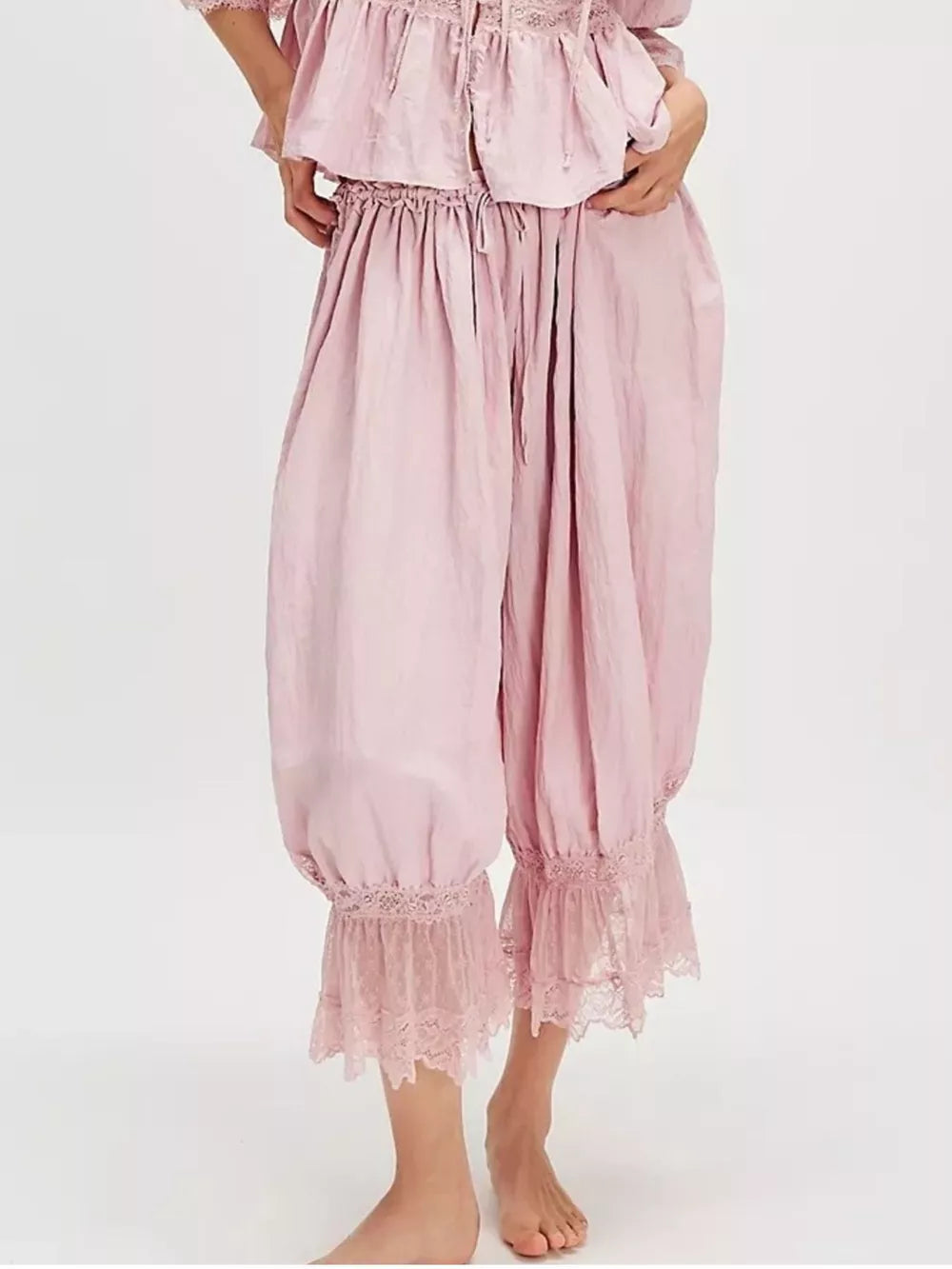 lounge pants in blush pink featuring tied and relaxed fit