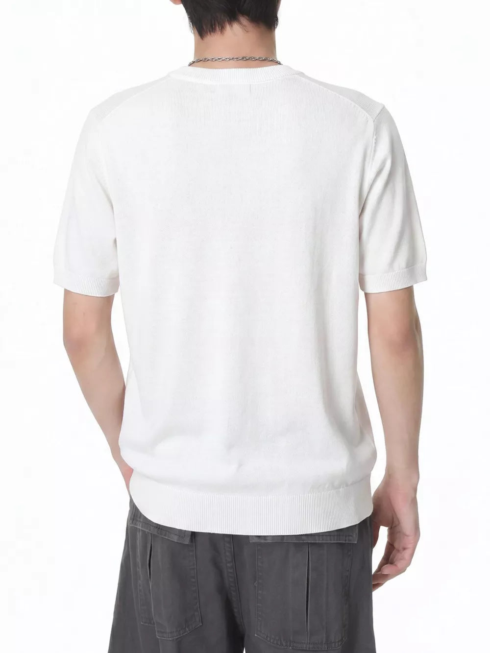 Men's white short sleeve knit t-shirt with ribbed hem and neckline.