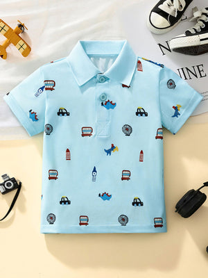 Light blue toddler polo shirt with cartoon cars and dinosaurs print