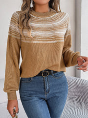 Tan knit sweater with geometric yoke pattern, crew neck, and long sleeves.