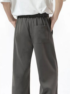 Men's dark gray sweatpants with elastic waist and a single back pocket.