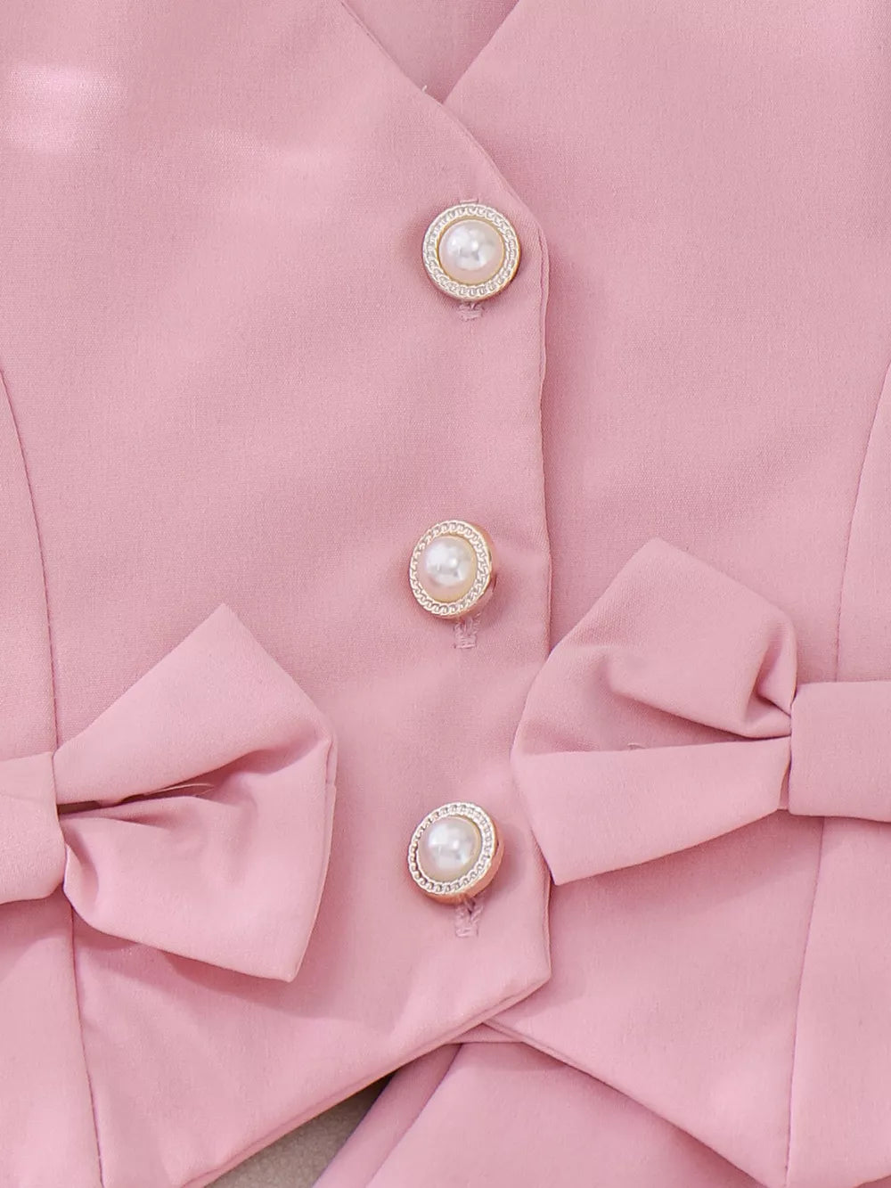 Children's Bow Button Up Vest And Skirt Set in Pink, model styling view