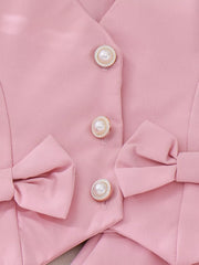 Children's Bow Button Up Vest And Skirt Set in Pink, model styling view
