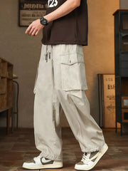 Men's Paris Gray drawstring cargo pants with button-flap pockets and adjustable cuffs.