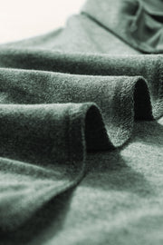 Textured dark gray sleeveless V-neck tank top with a soft, breathable fabric.