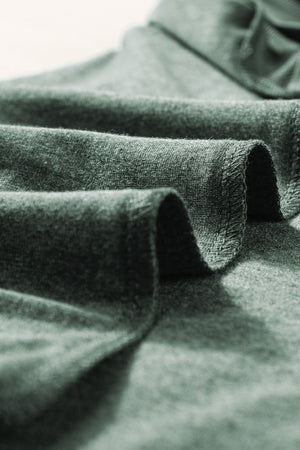 Textured dark gray sleeveless V-neck tank top with a soft, breathable fabric.
