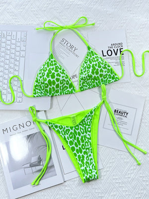Green leopard print tie-side bikini set with neon green trim and ties.