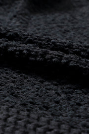 Black textured bouclé open-front jacket detail