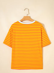 Striped round-neck t-shirt in tangerine and yellow cotton with short sleeves.