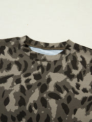 Mock neck tee with abstract leopard print in grey and black, slim fit.