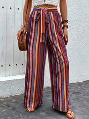 Bohemian stripe palazzo trousers in rust with tie waist and wide leg