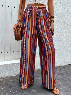 Bohemian stripe palazzo trousers in rust with tie waist and wide leg