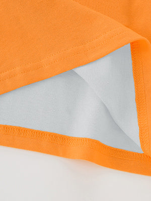 Orange toddler t-shirt detail showing hem and seam construction