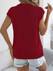 Diamond knit sleeveless top in burgundy with a crew neck.