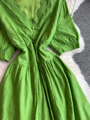 Green lace-embellished A-line midi dress with V-neck and button detail