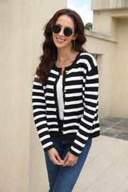 Black and white striped crewneck cardigan with gold buttons.