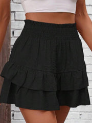 Black tiered ruffle skort with smocked waist, 100% polyester