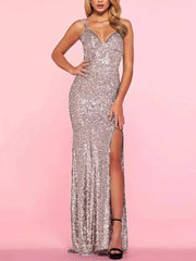 Sequin maxi dress with spaghetti straps and high slit in champagne.