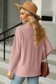 Textured Henley V-Neck Top in Blush Pink with long sleeves and a subtle diamond pattern.