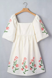 Cream floral puff sleeve square neck A-line dress with embroidered flowers.
