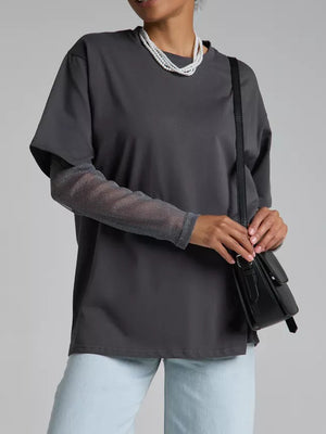 Dark gray oversized t-shirt with sheer metallic long sleeves and a crew neck.