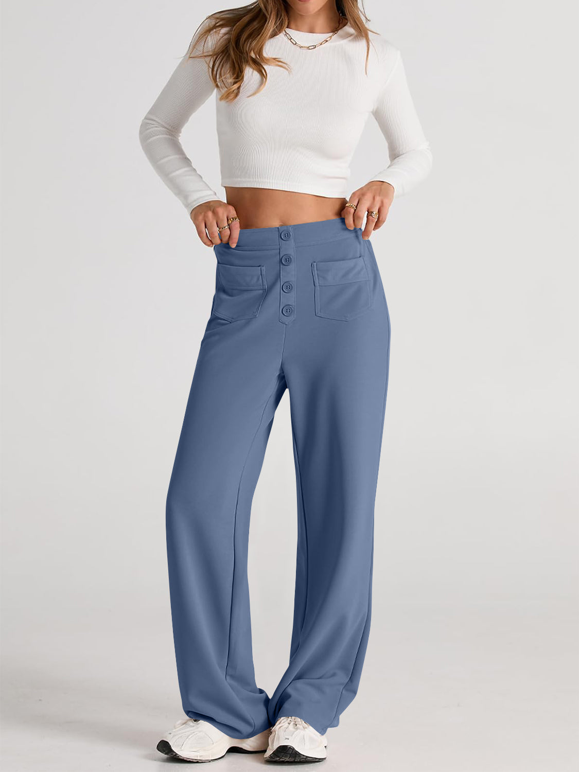 Button-front wide leg trousers in Dusty Blue with flap pockets.