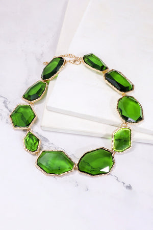 Green prismatic resin stone collar necklace with gold alloy chain and clasp.