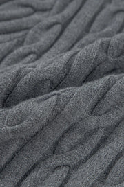 Dark gray cable knit sweater with textured detail