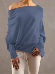 Dusty Blue off-shoulder knit sweater with textured cuffs and batwing sleeves.