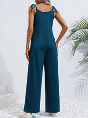 Deep Teal tie-strap wide leg jumpsuit with pockets, shown from the back.