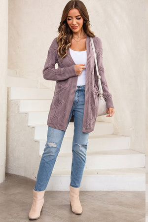 Lilac cable knit open-front cardigan with pockets, acrylic material.