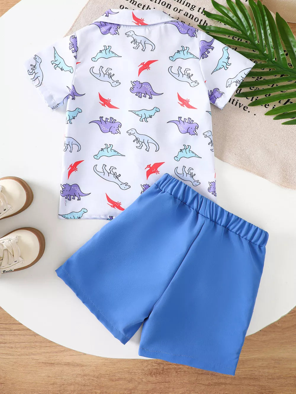 Toddler dinosaur print short sleeve shirt and blue shorts set
