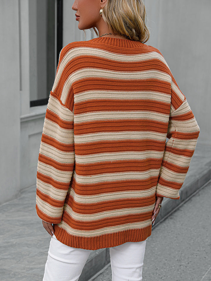 Chunky stripe relaxed fit knit sweater in burnt coral and beige acrylic with crew neck.