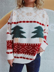 Beige knit sweater with festive appliqué Christmas trees, snowflakes, and geometric patterns.