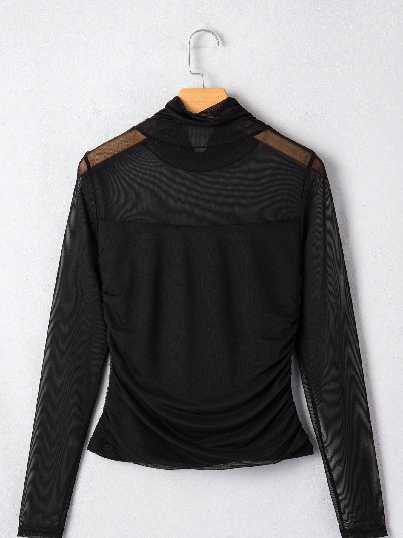Black sheer mesh maternity shirt with high neck and ruched sides