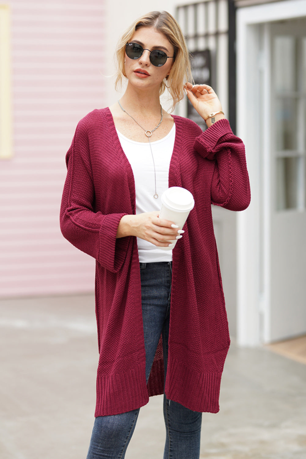 Burgundy open-front maxi knit cardigan with textured acrylic fabric and ribbed cuffs.