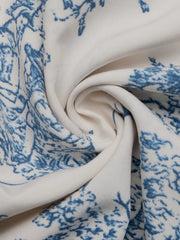 Toile print midi dress in blue and white with a V-neck.