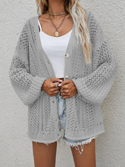 Open-knit button-down cardigan in gray with balloon sleeves and a relaxed fit.