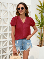 Burgundy dotted swiss blouse with puff sleeves, lace trim neckline and center panel.