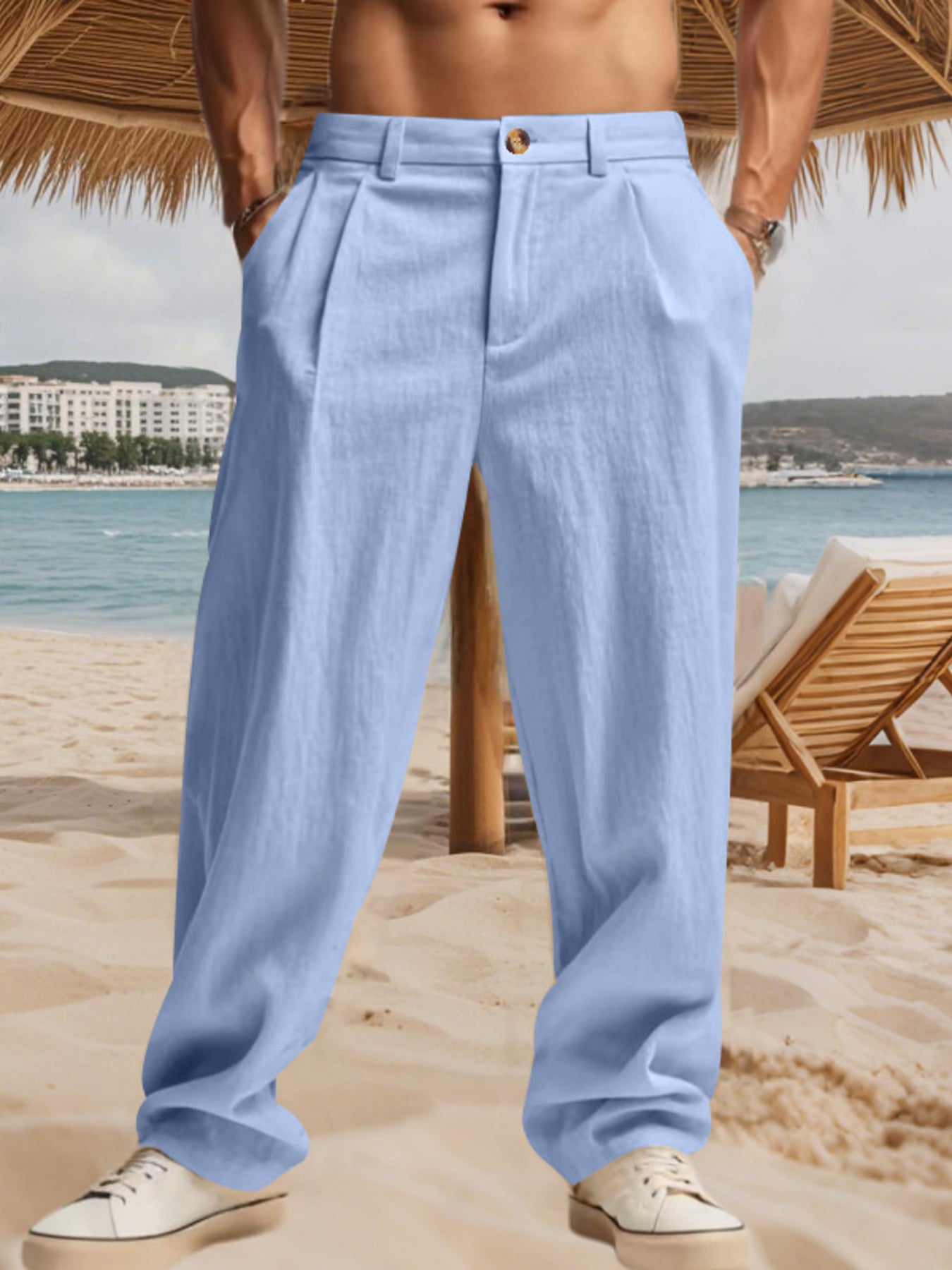 Light blue relaxed fit sweatpants with pleats and pockets.
