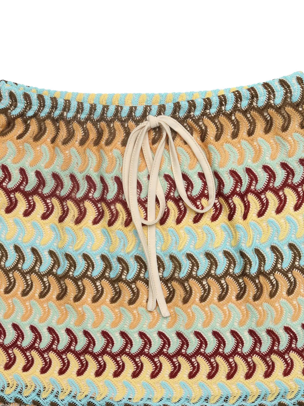 Vibrant crochet mini skirt with a beige drawstring and colorful wavy pattern.