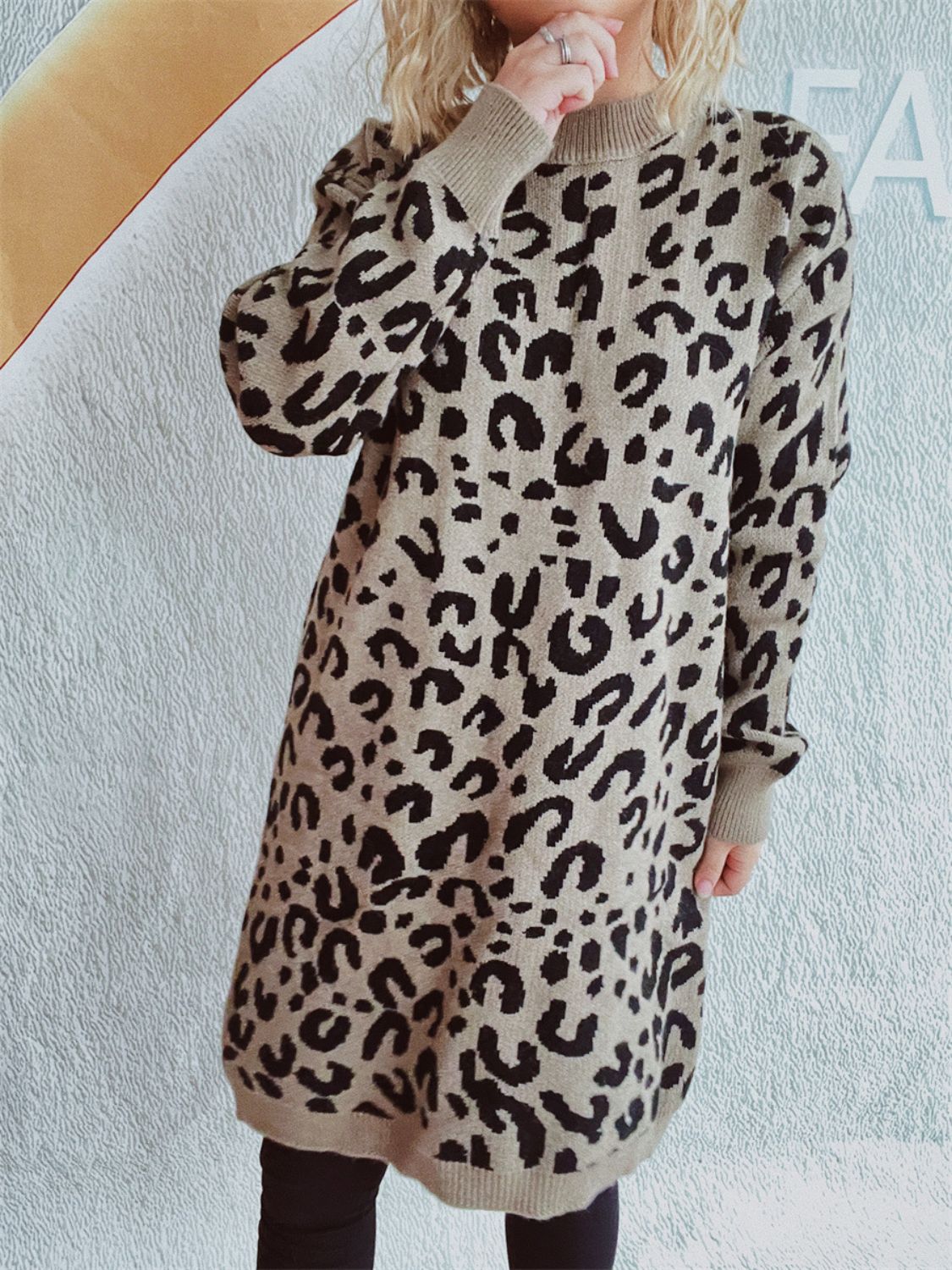 Leopard knit mini dress in caramel with a mock neck and long sleeves.