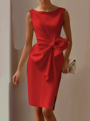 Red sleeveless dress with large bow detail and side slit, boat neck.