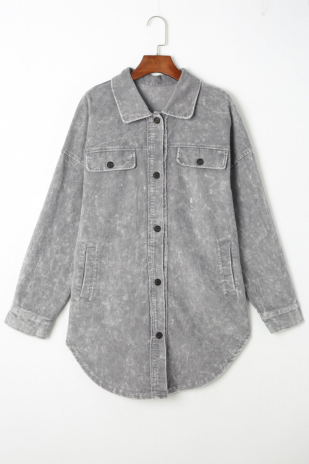 Textured corduroy overshirt in Cloudy Blue with faded wash, button front, and chest pockets.